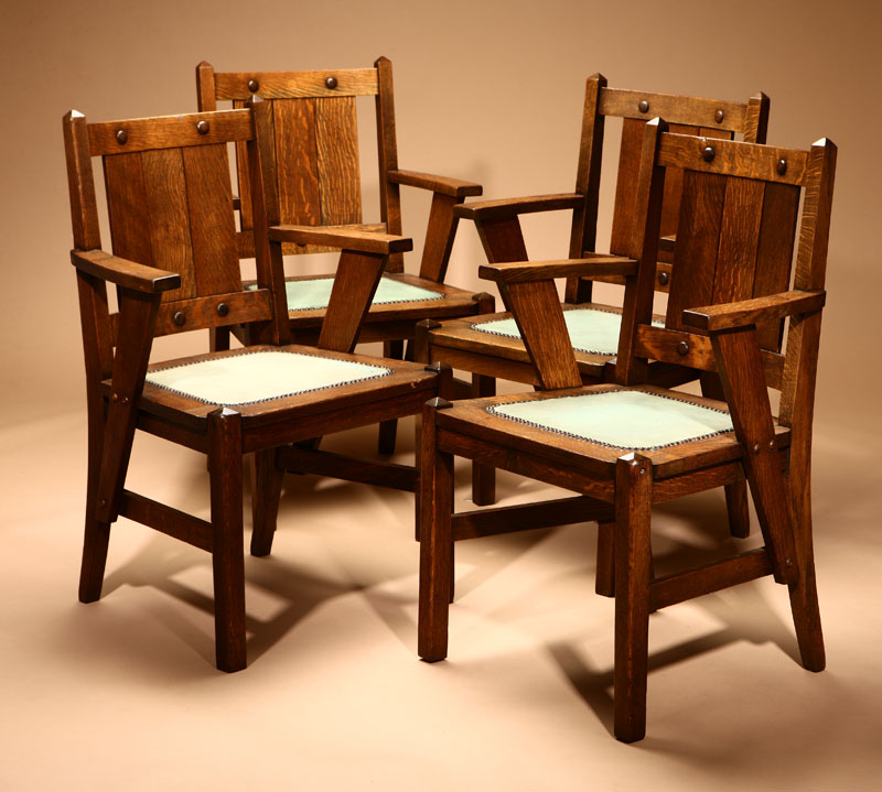 A set of four Arts & Crafts oak