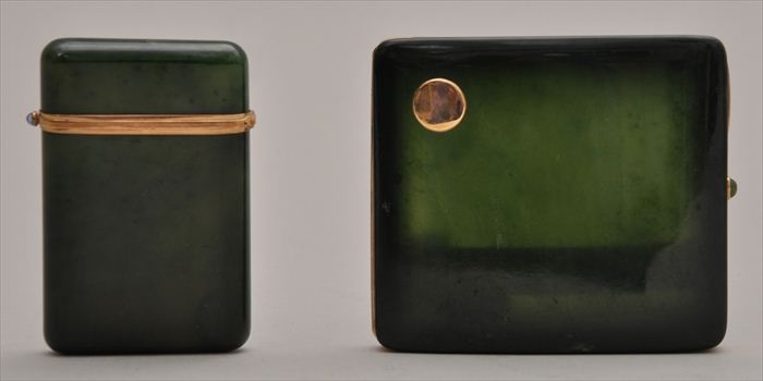 TWO GOLD-MOUNTED NEPHRITE CIGARETTE