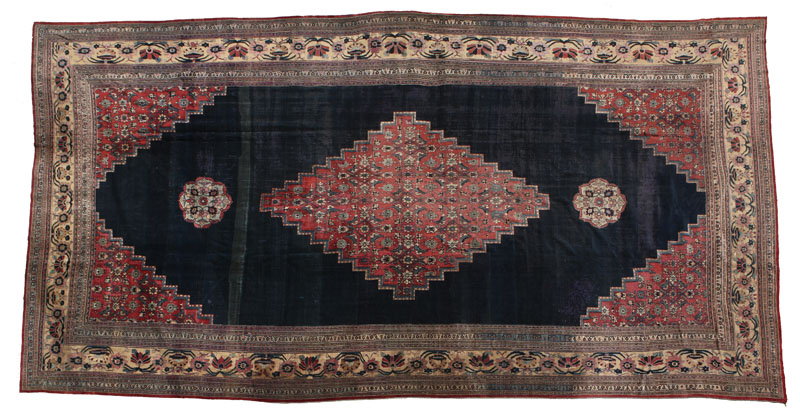 An antique Persian Khorasan carpet