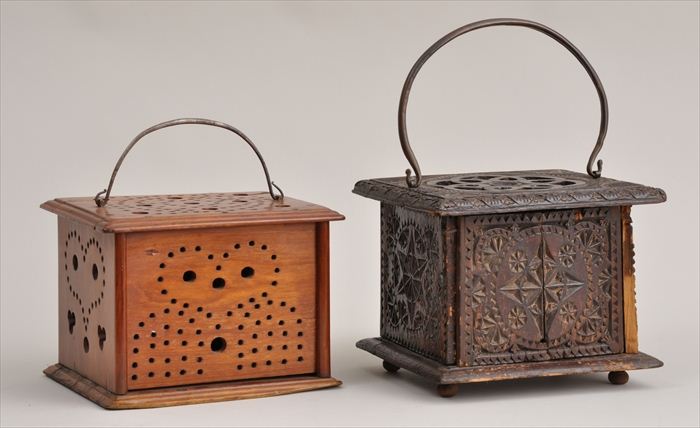 TWO CARVED WOOD FOOT WARMERS WITH
