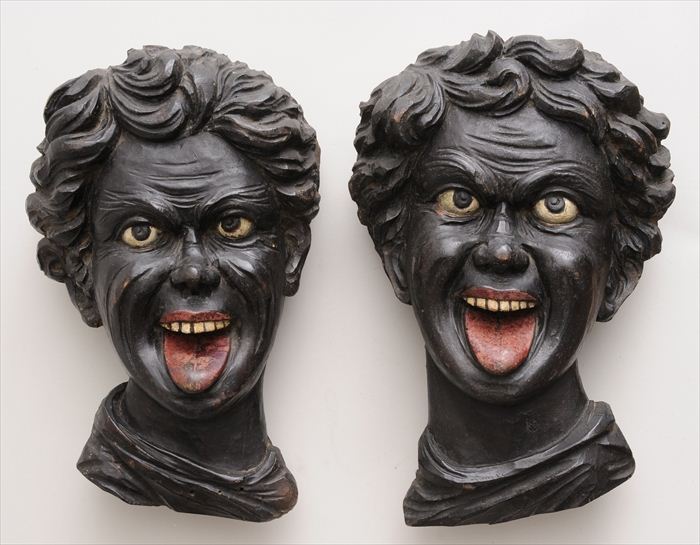 PAIR OF GERMAN CARVED AND PAINTED