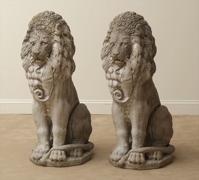 PAIR OF CAST STONE LIONS Each modeled 13f35b