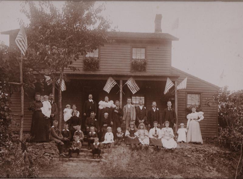 UNKNOWN: FAMILY GATHERING AT THE HOMESTEAD