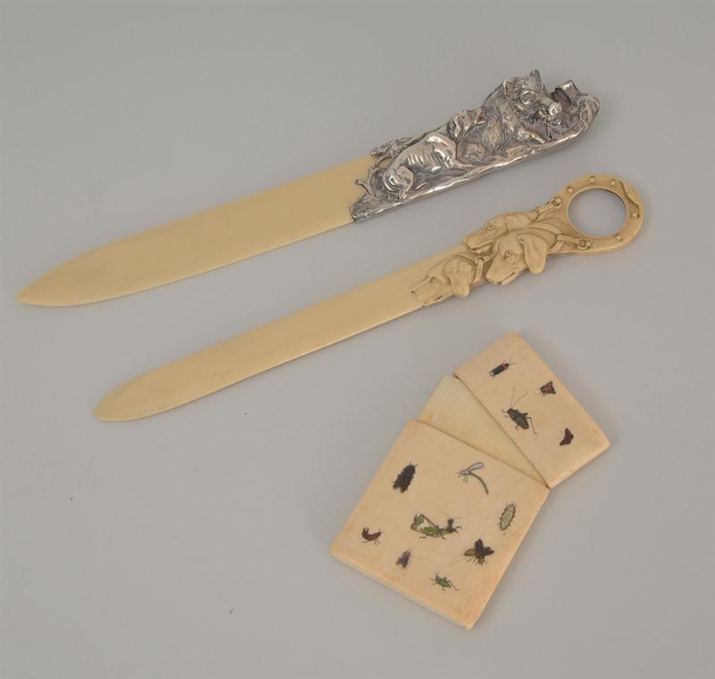 TWO FAUX IVORY PAGE CUTTERS AND 13f6b8