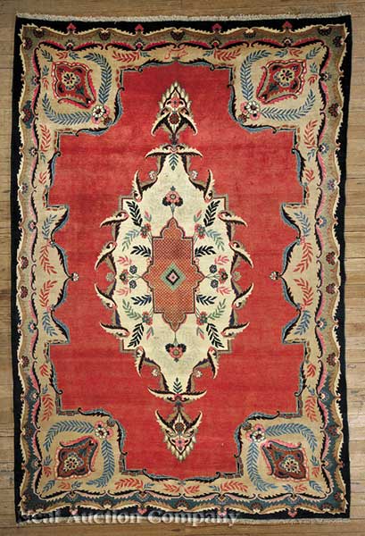 A Persian Tabriz Carpet red ground 13fcc4