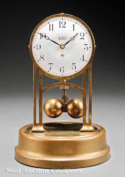 A Tiffany Neverwind Brass Mantel Clock