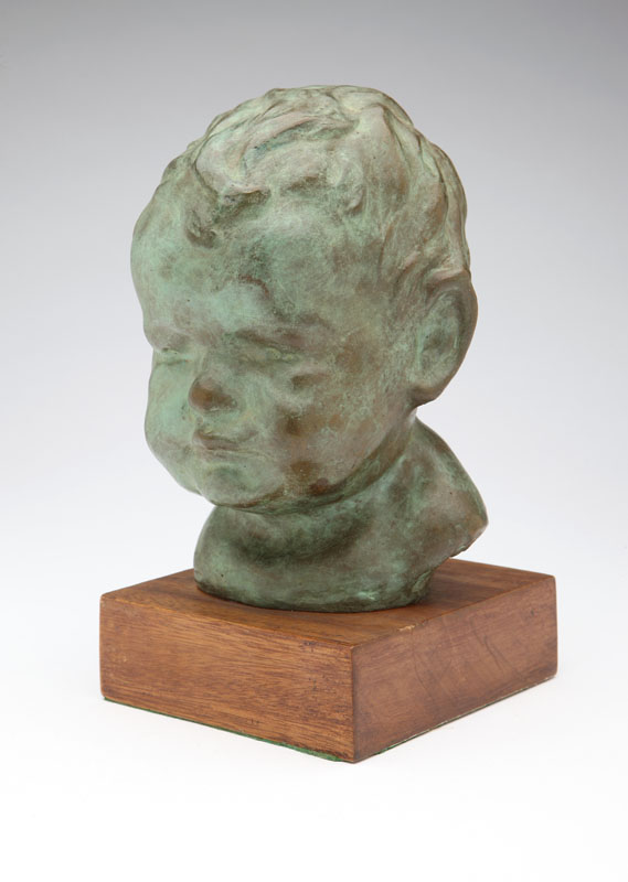 A patinated bronze bust depicting