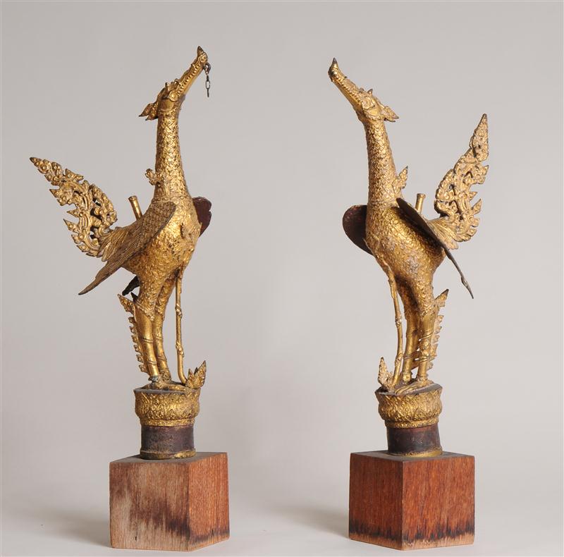 PAIR OF THAI GILT-METAL BIRD FINIALS