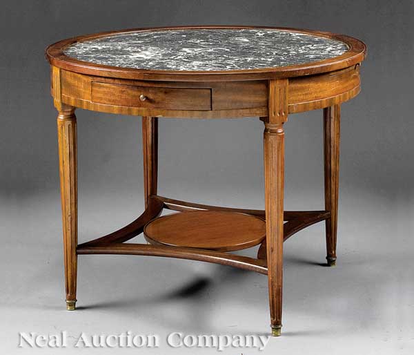 An Antique Directoire-Style Carved Mahogany