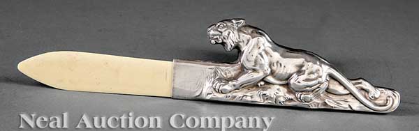 A Continental Silver and Ivory Lion-Form