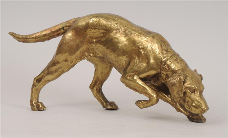 GILT-METAL FIGURE OF A HOUND ON THE