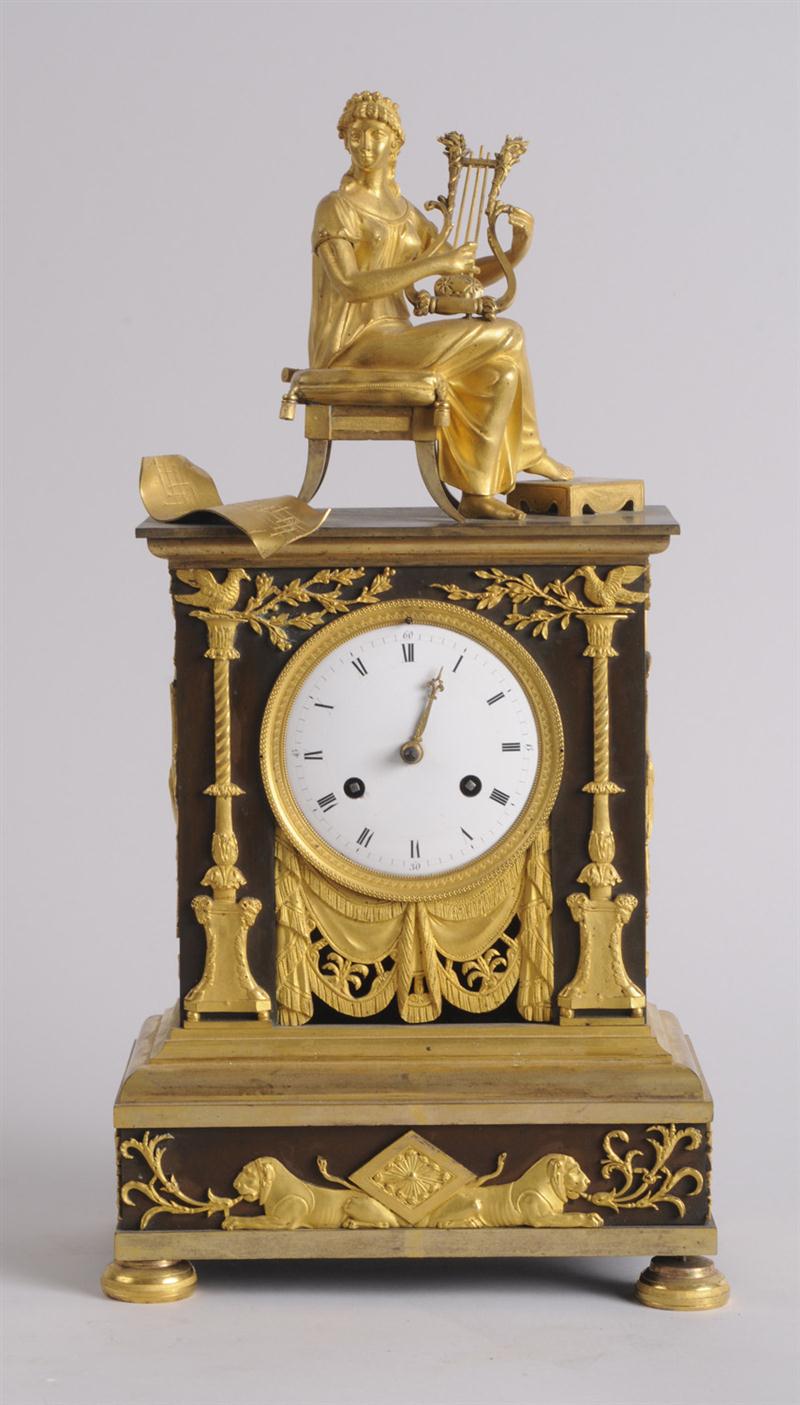 EMPIRE PATINATED AND GILT-BRONZE