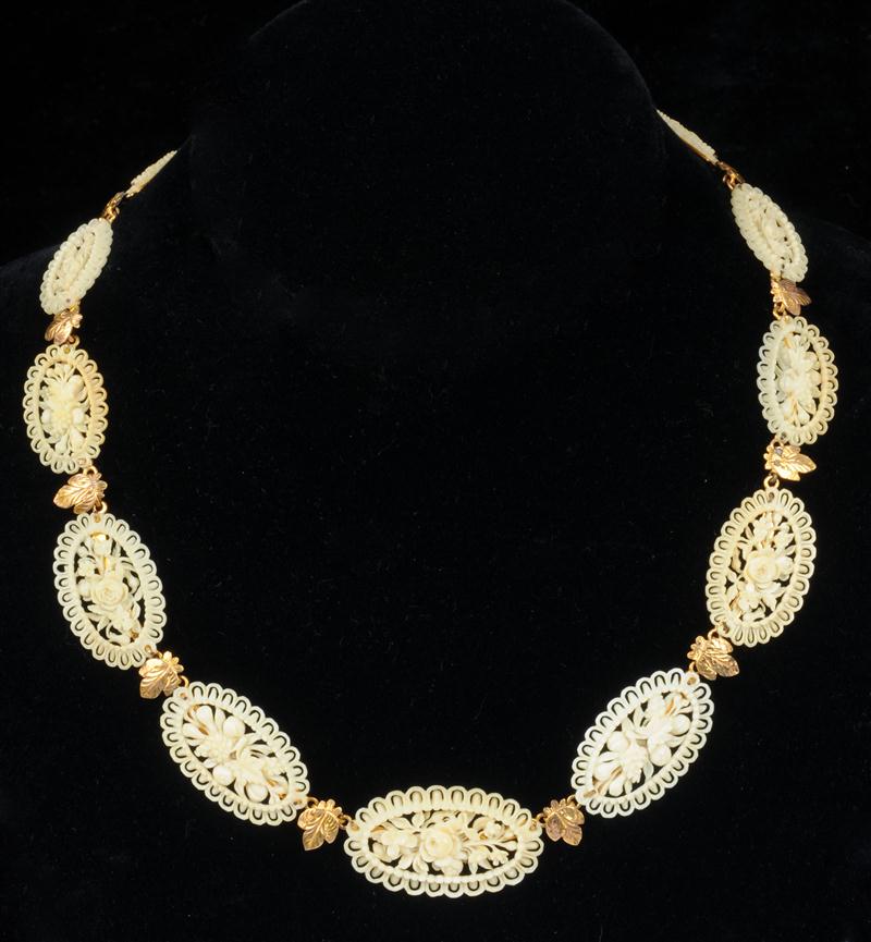 ANTIQUE GOLD AND CARVED IVORY NECKLACE
