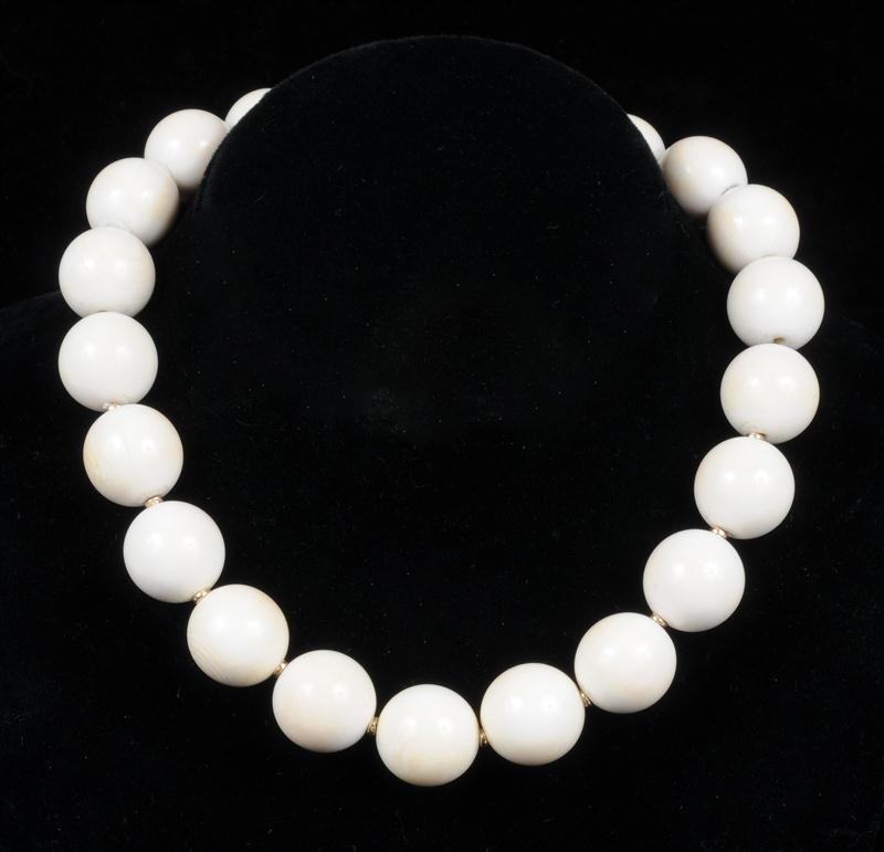 IVORY BEAD AND RING SET The necklace