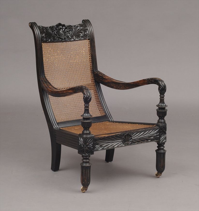 ANGLO-INDIAN CARVED EBONY ARMCHAIR