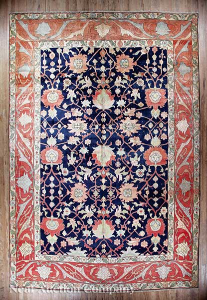 A Persian Serapi Carpet navy and