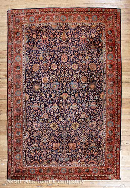 An Antique Oriental Rug navy and