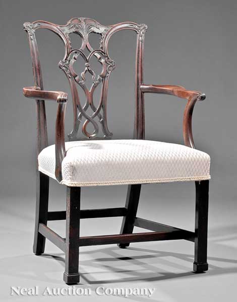 A Georgian Carved Mahogany Armchair