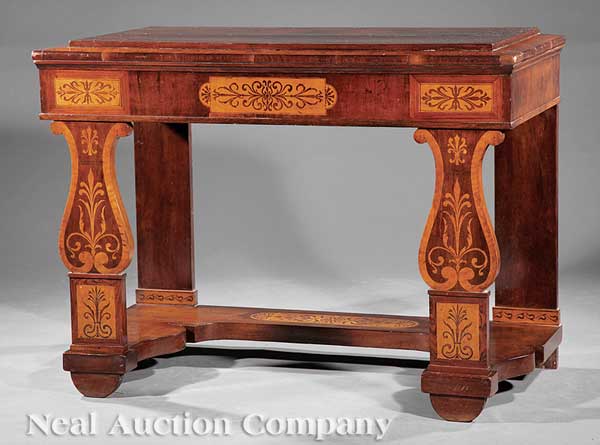 A Continental Carved Mahogany and