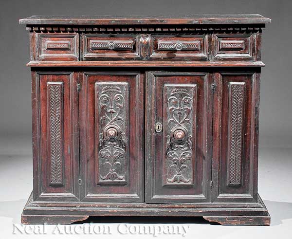 An Antique Italian Carved Walnut