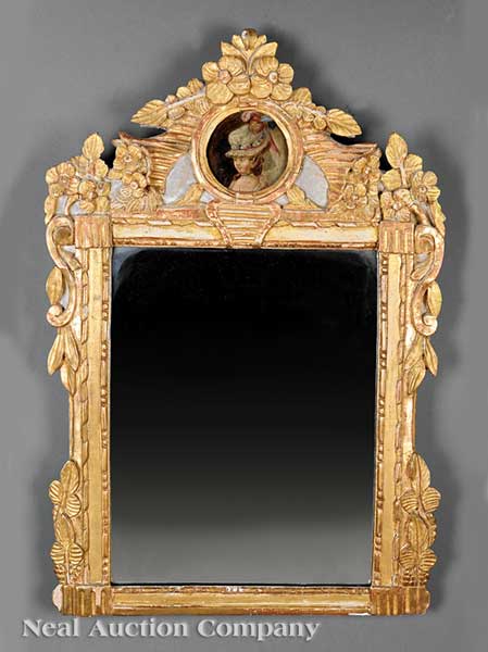 A Louis XVI Carved Giltwood Mirror