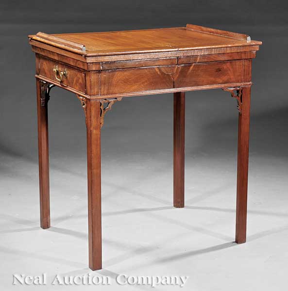 An Antique George III Carved Mahogany