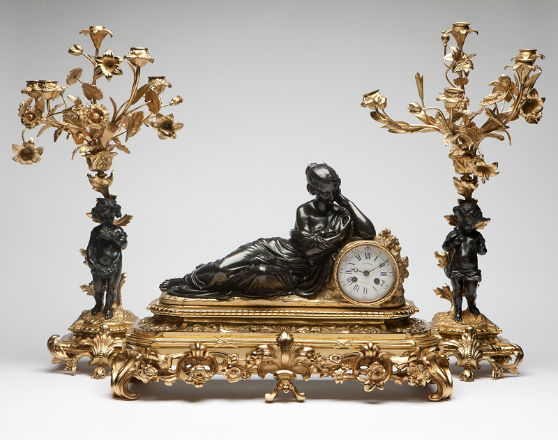 A French patinated and gilt bronze