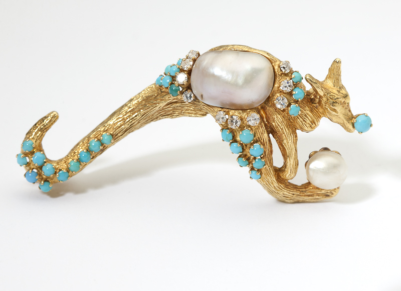 A baroque cultured pearl diamond