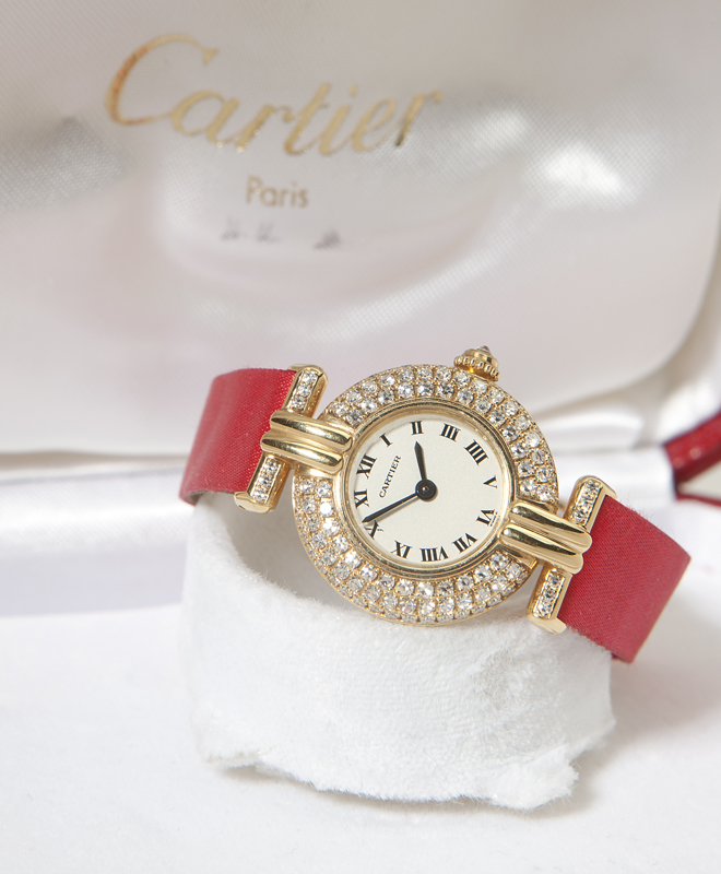 A lady's 18K gold wristwatch Cartier