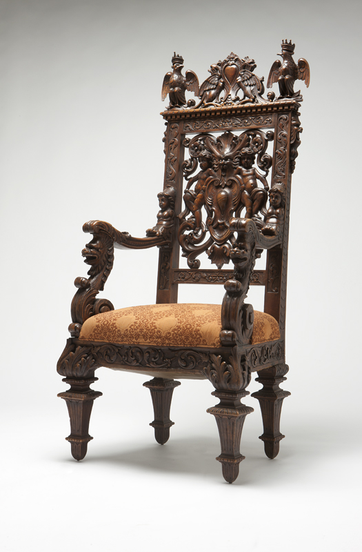 An elaborately carved and figured 142323