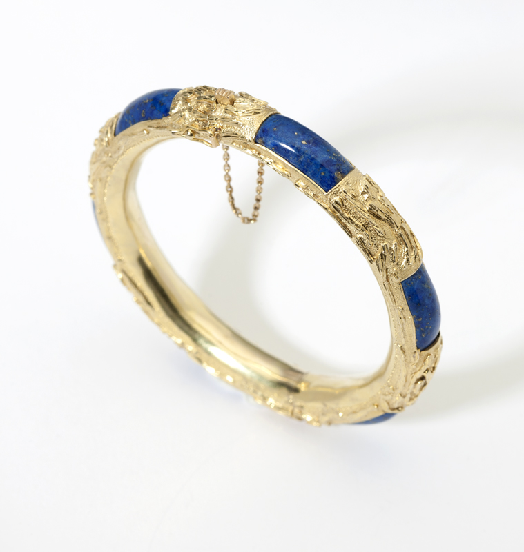 A gold and lapis lazuli bangle 14K gold