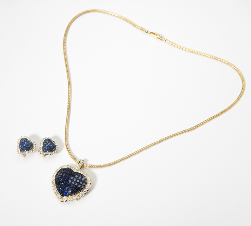 A sapphire diamond and gold heart pendant-brooch