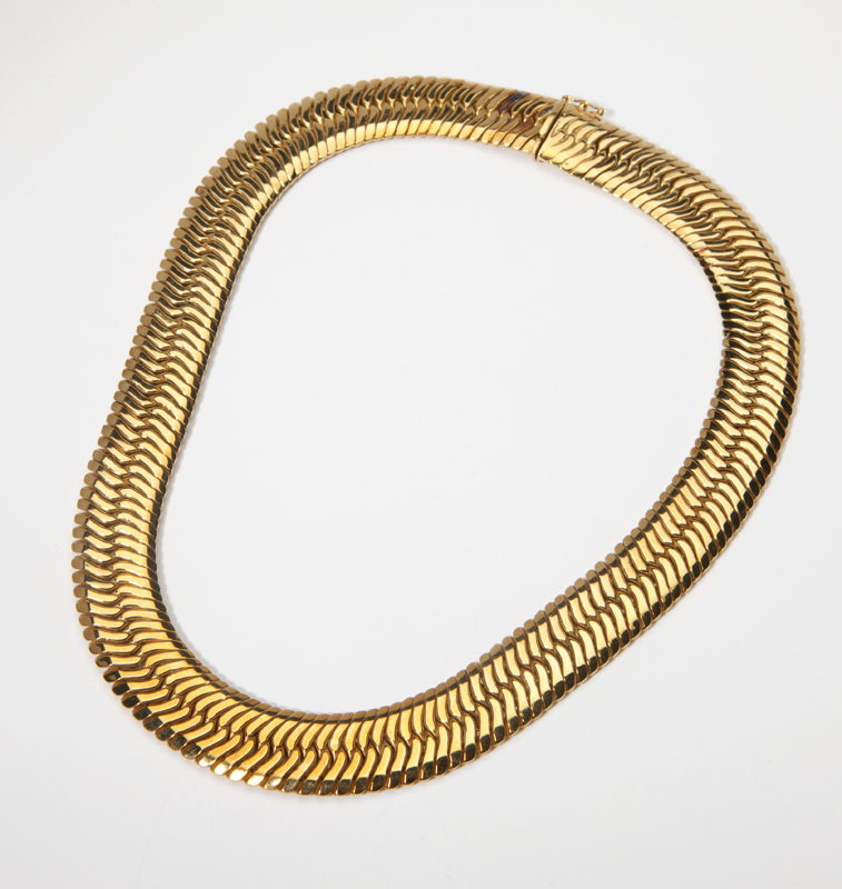 A gold flat link collar necklace
