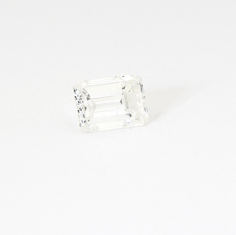 An unmounted 0.91 ct emerald-cut