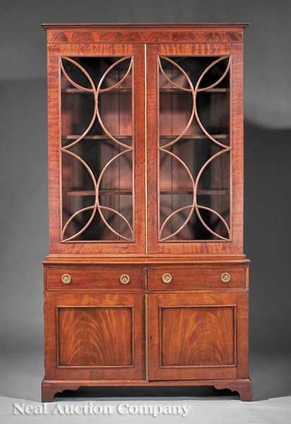 A Regency Carved Mahogany Bookcase