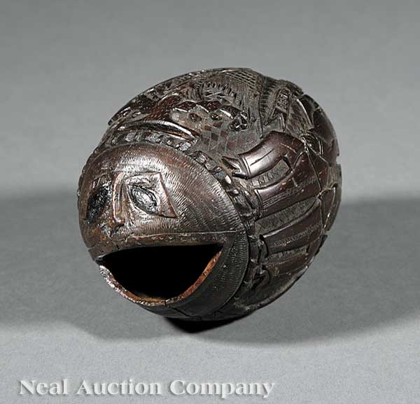 An Antique Mexican Carved Coconut