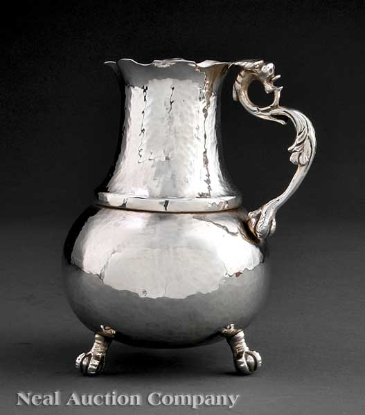 A Hammered Silverplate Water Pitcher