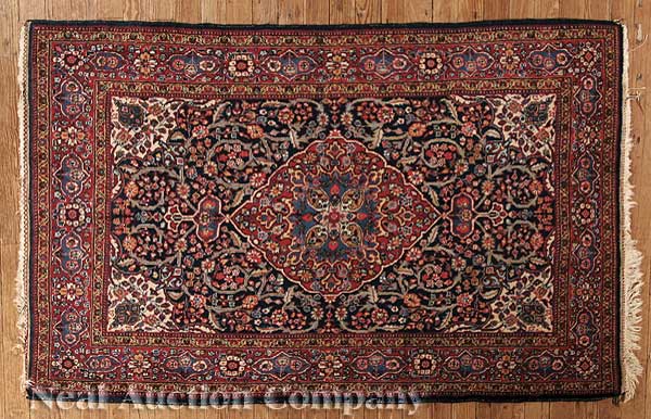 A Small Antique Persian Rug red