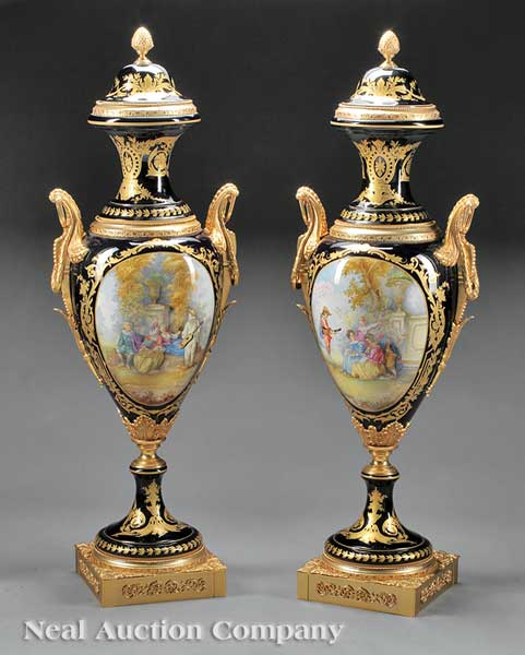 A Pair of Large Gilt and Polychrome