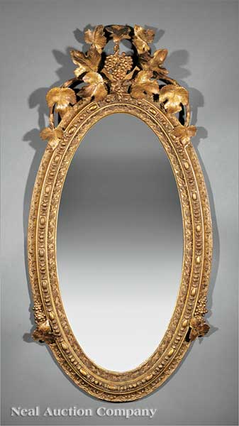 A Beaux Arts Giltwood Oval Looking