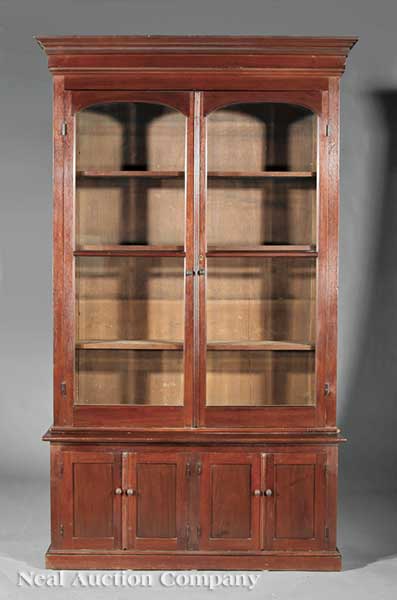 An American Carved Walnut Bookcase 1404ba