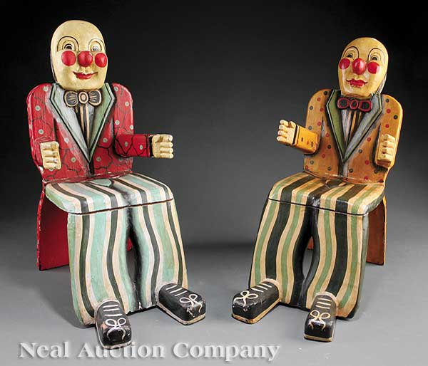 A Pair of Carved and Polychromed Childs