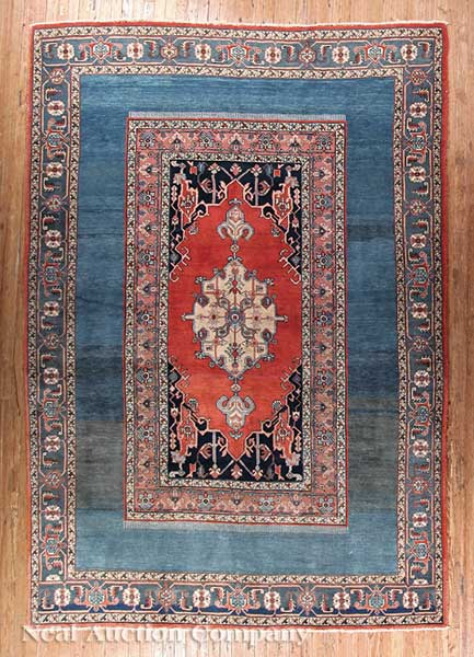 A Persian Serapi Carpet blue and