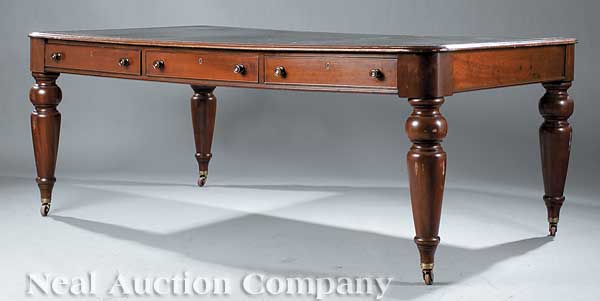 An English Mahogany Library Table the