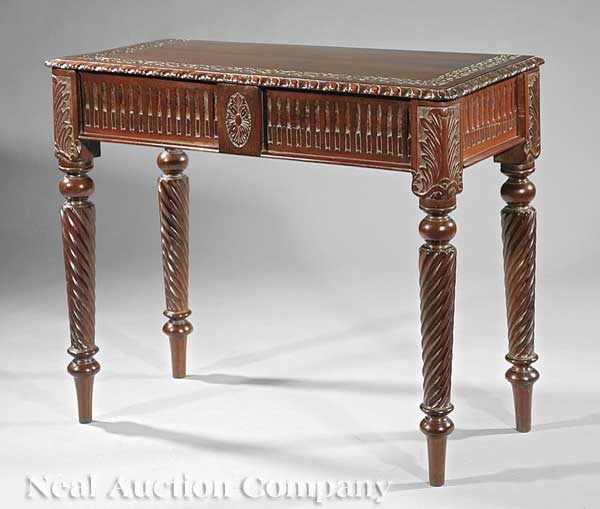 An Anglo Colonial Carved Mahogany