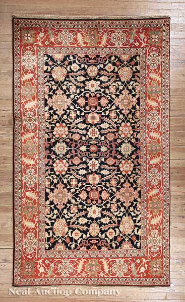 A Fine Persian Serapi Carpet red