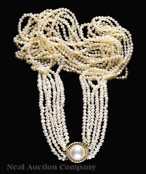 A Triple Strand Necklace of Freshwater