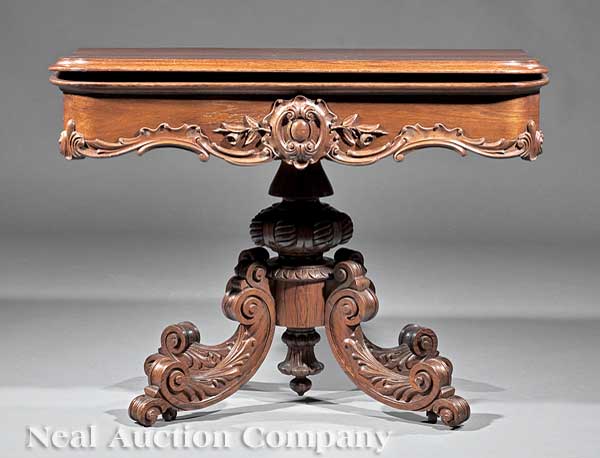 An English Rococo Carved Rosewood