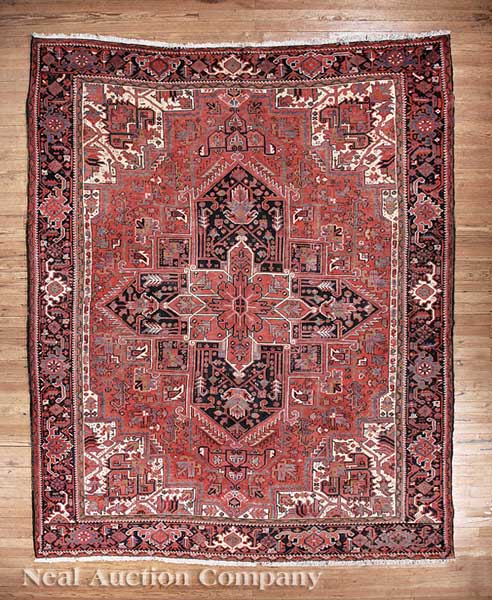 A Persian Heriz Carpet crimson 140a0d