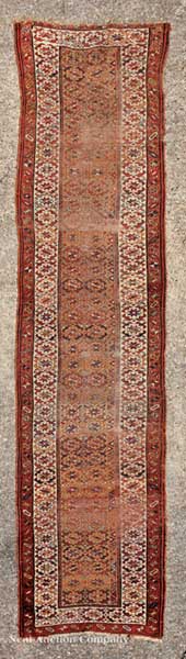 A Persian Runner gold and crimson 140a23
